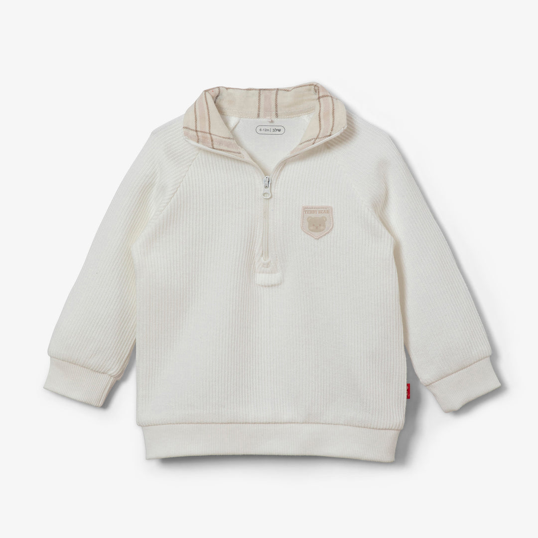 סוודר בצבע אוף וויט