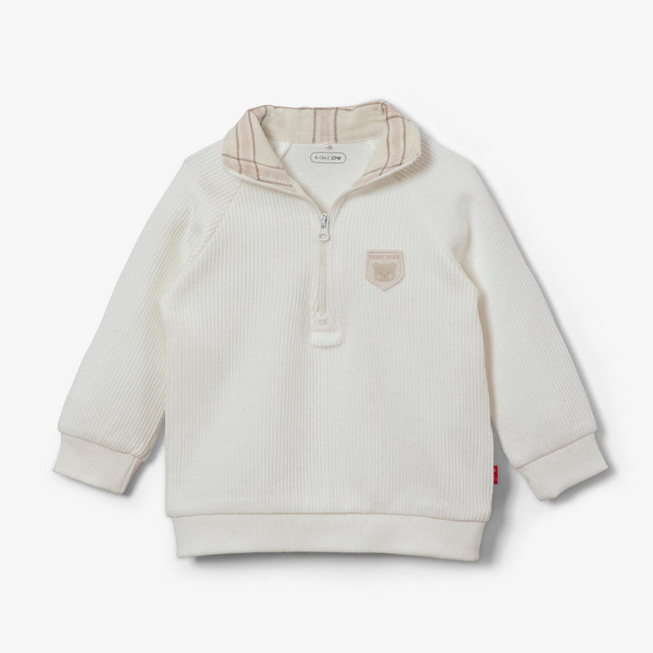 סוודר בצבע אוף וויט