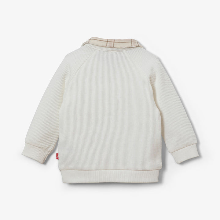 סוודר בצבע אוף וויט