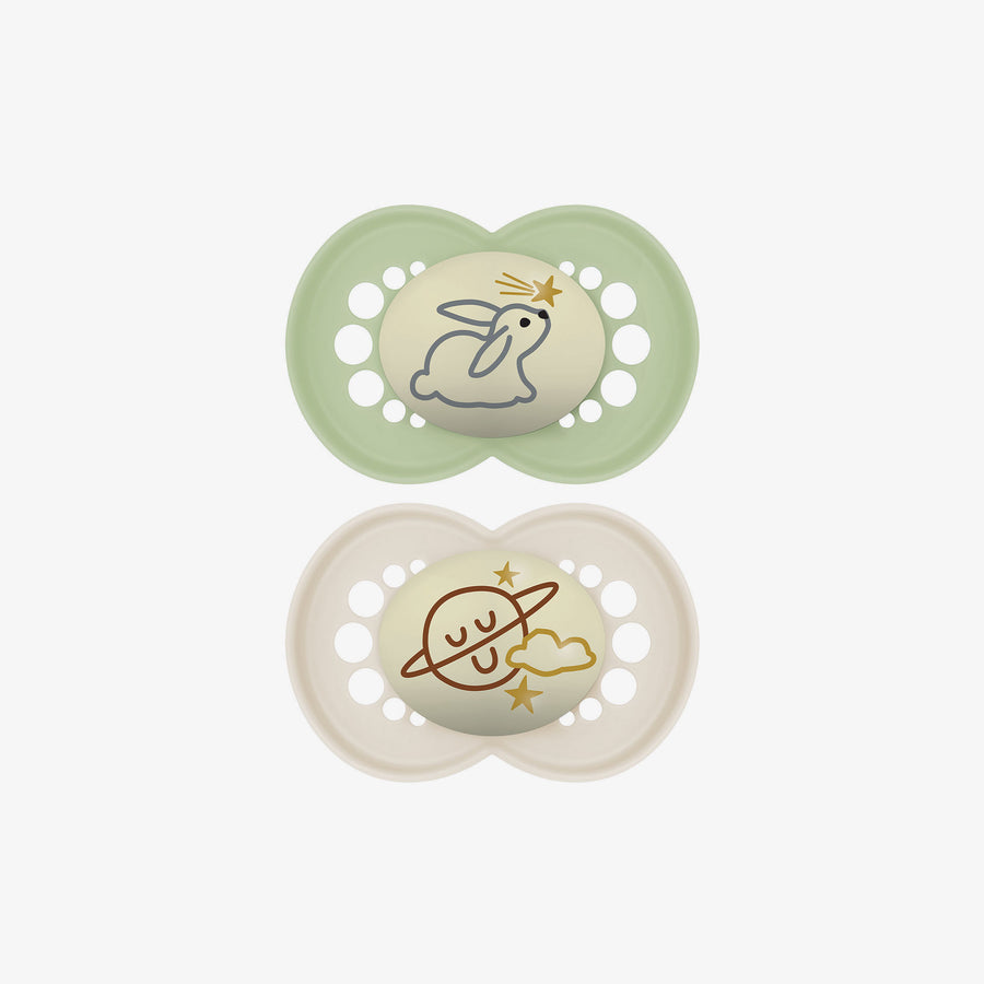 זוג מוצצים סיליקון 6+ זוהרים בחושך ירוק/ לבן מודפס