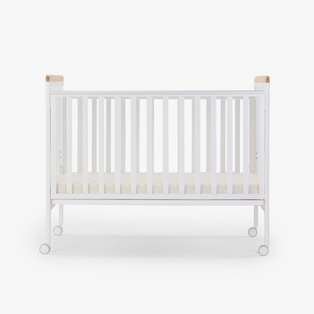 מיטת תינוק דגם ג'וי לבן + טבעי