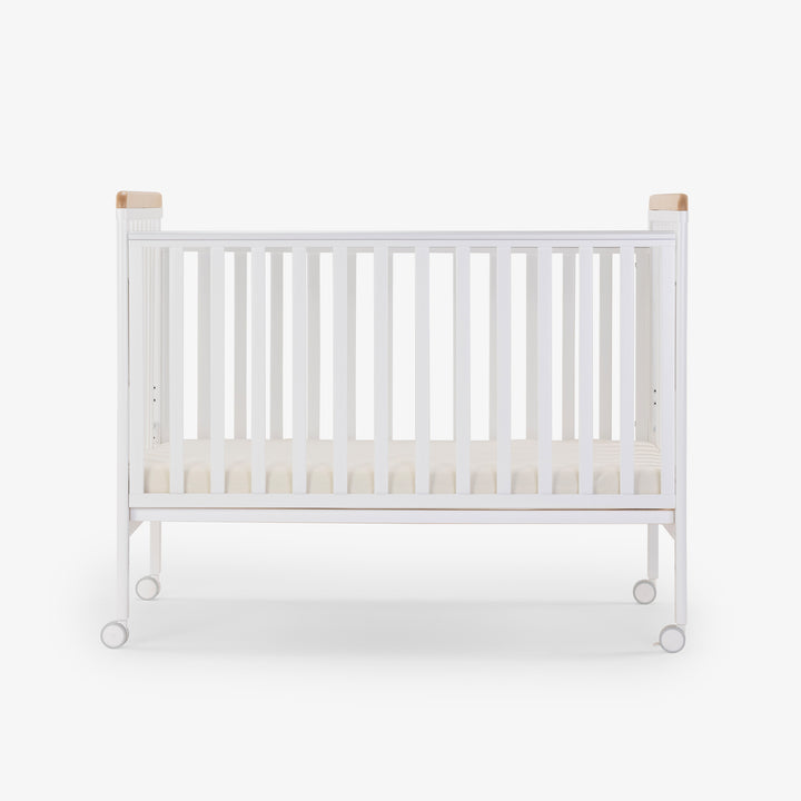 מיטת תינוק דגם ג'וי לבן + טבעי