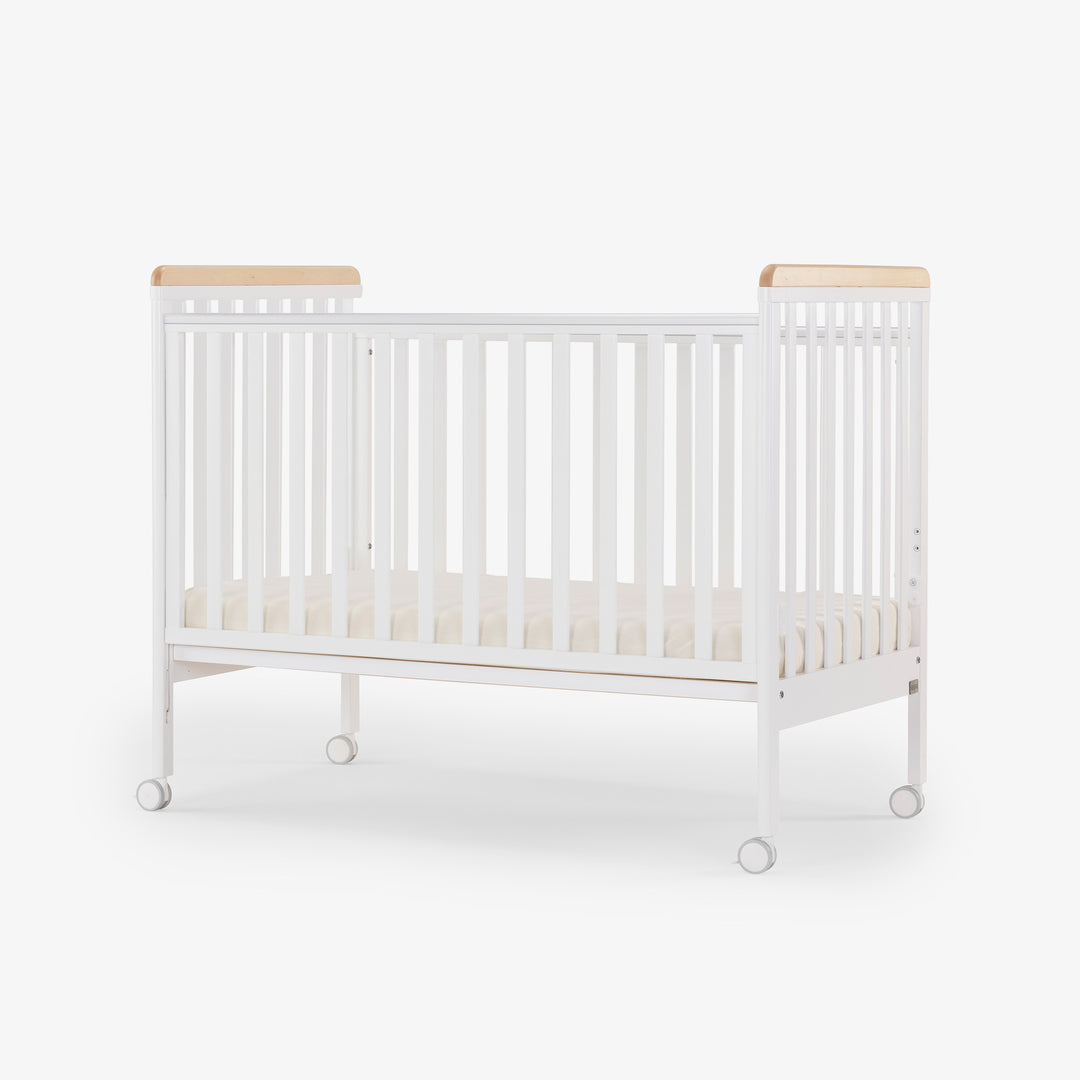 מיטת תינוק דגם ג'וי לבן + טבעי