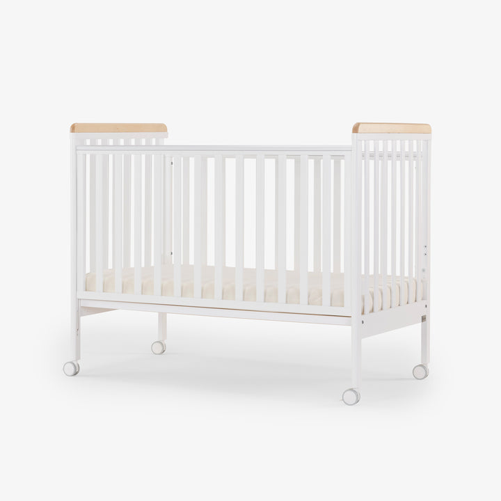 מיטת תינוק דגם ג'וי לבן + טבעי