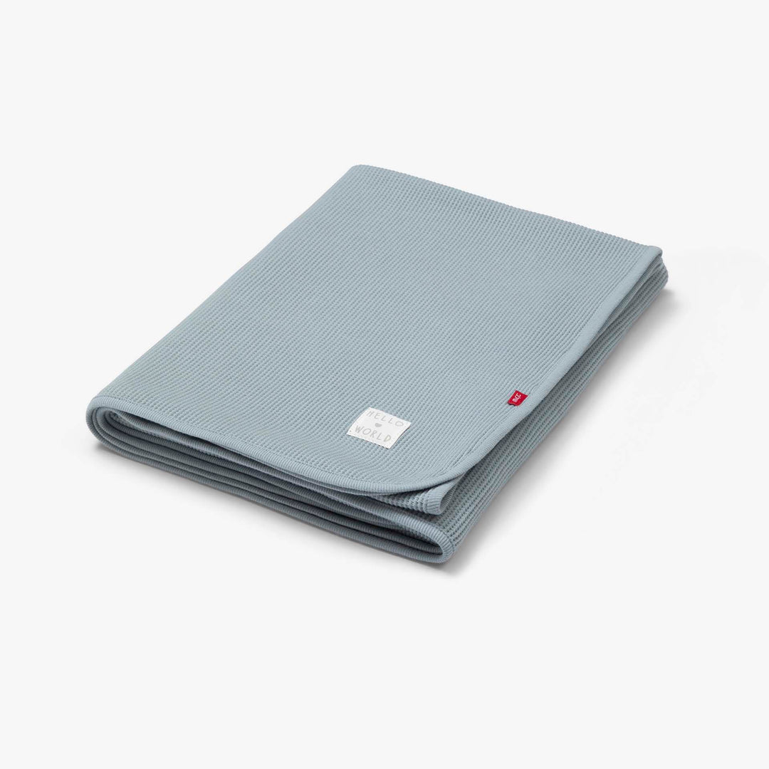 שמיכת וופל למיטת מעבר תכלת