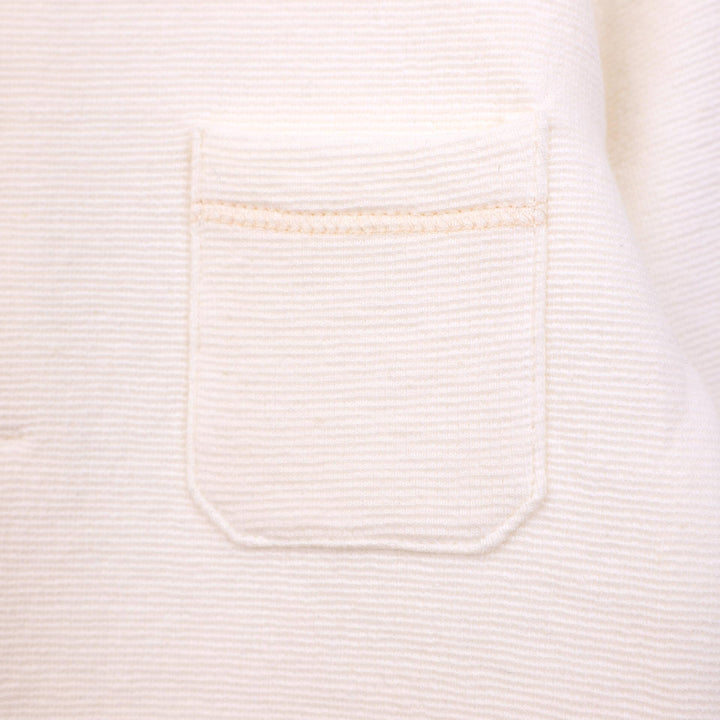 בגד גוף עם כפתורים ושרוול ארוך בגוון שמנת