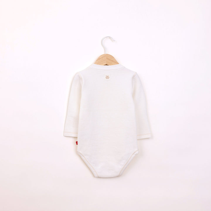 בגד גוף עם כפתורים ושרוול ארוך בגוון שמנת