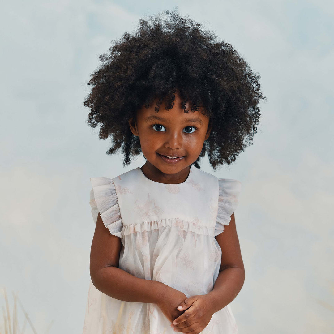 שמלה חגיגית בהדפס פרחים ועלים