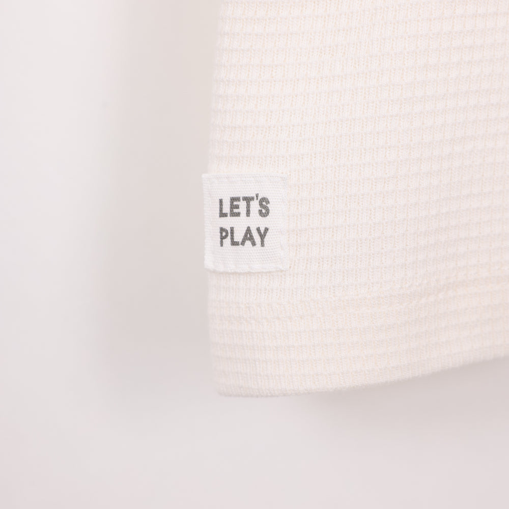 חולצה קצרה בצבע שמנת