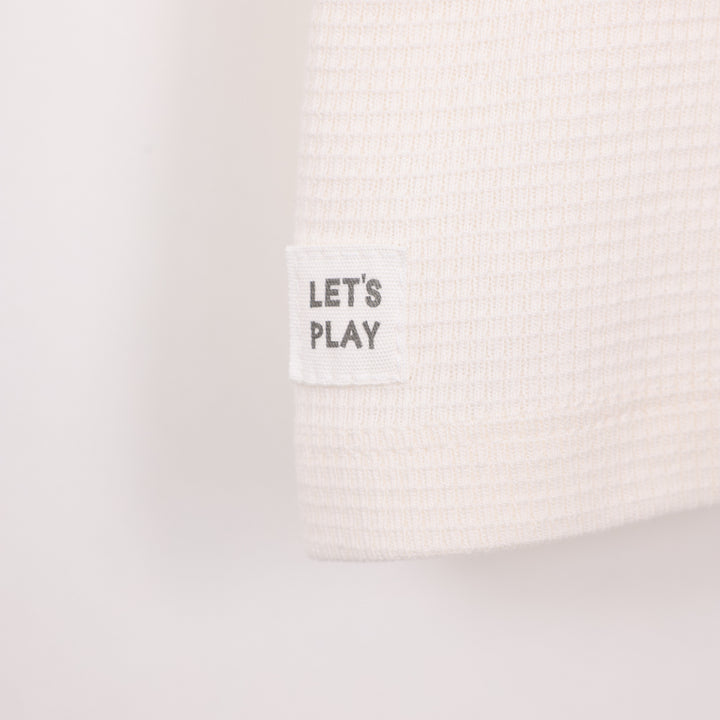 חולצה קצרה בצבע שמנת