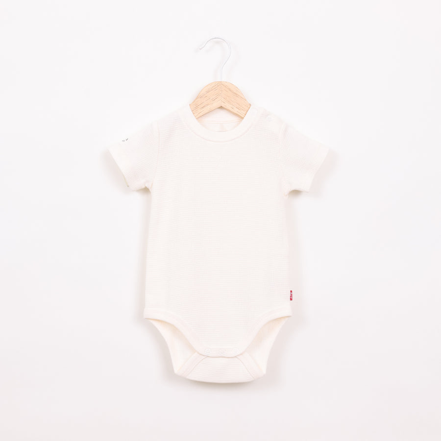 בגד גוף שרוול קצר בגוון שמנת