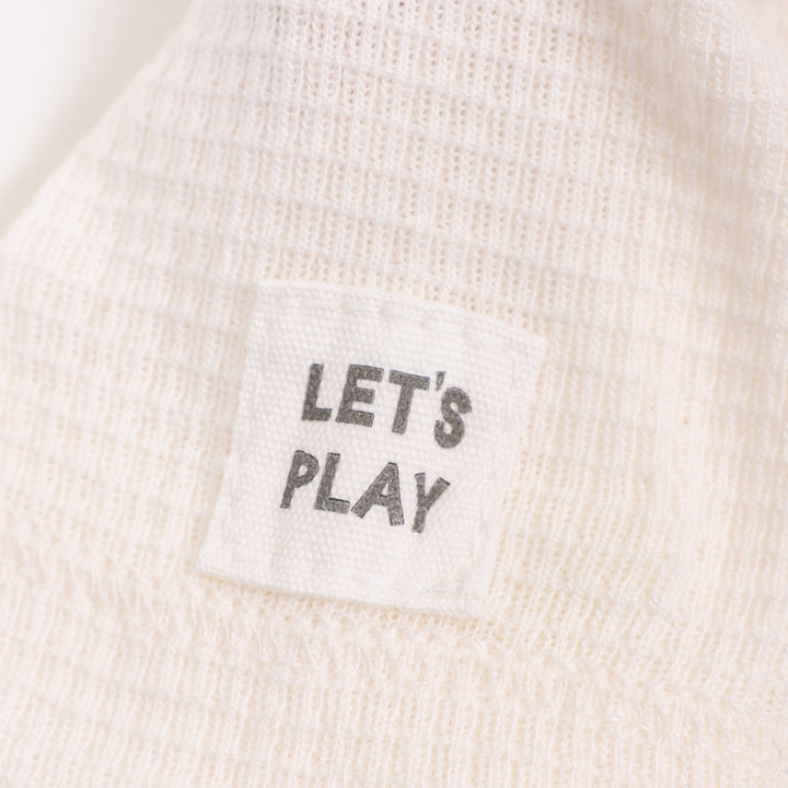 בגד גוף שרוול קצר בגוון שמנת
