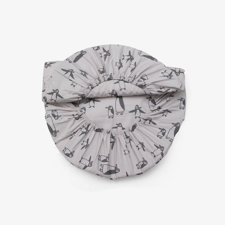 בסיס קן לתינוק פינגווין אפור בז'