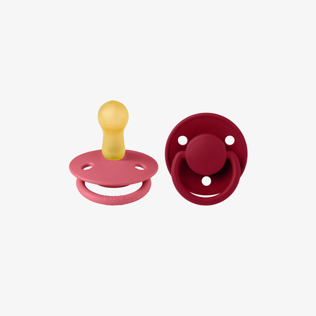 זוג מוצצים לטקס אדום/פוקסיה דהלוקס 6+ -ביבס Bibs